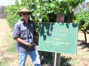 Man standing next to Best's Wines Pinot Noir Block