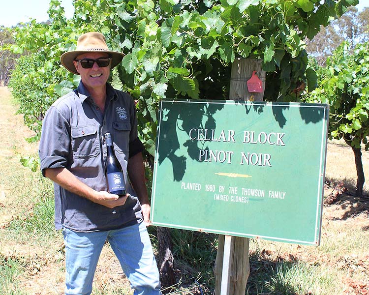 Man standing next to Best's Wines Pinot Noir Block - Thumbnail