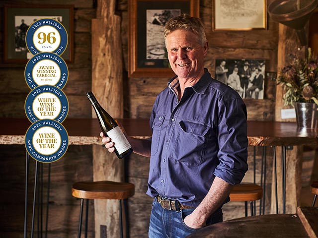 Ben Thomson holding a bottle of 2021 Foudre Ferment Riesling, winner of the 2023 Halliday Wine of the Year, Best White wine and Best Riesling