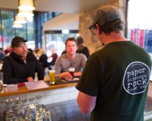 Customers being served at Paper Scissors Rock Brewery