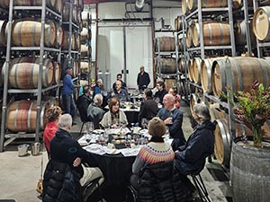 Guests enjoying a special tasting event in the barrel shed at Best's Great Western