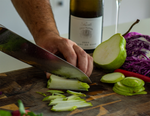 @another_food_blogger slicing green pear
